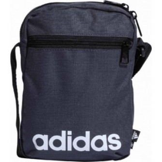 Granatowa torebka na ramię Adidas Essentials Organizer 2 l z białym logo, przednią kieszenią na zamek i regulowanym paskiem