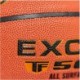 Pomarańczowa piłka do koszykówki Spalding Excel TF-500 76797Z r. 7 z czarnymi kanałami i logo Spalding