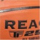 Pomarańczowa piłka do koszykówki Spalding React TF-250 76801Z r. 7 z czarnymi kanałami, fakturowaną powierzchnią i logo Spalding